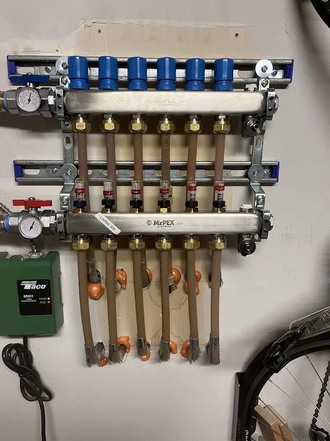 Plumber performing Water Heater Repair at a residential property in Oxon Hill